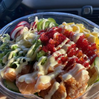 Poke Loa - Mandeville - Salmon, spicy tuna, lemon aioli, radishes, cucumbers, mango, cilantro - Poke Near Me - Mandeville, Louisiana Poke Loa - Mandeville - Salmon, spicy tuna, lemon aioli, radishes, cucumbers, mango, cilantro - Poke Near Me - Mandeville, Louisiana
