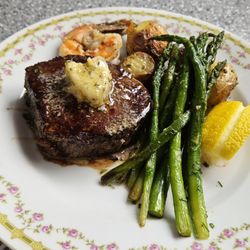 Chef For Hire - Petite filet with garlic herb butter colossal shrimp asparagus and roasted new potatoes