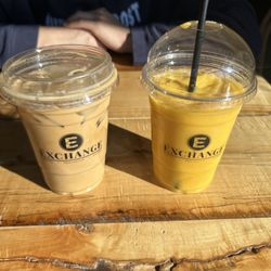 The Exchange Coffee, Mercantile, & Eatery - iced lavender latte w/ oatmilk & a mango smoothie