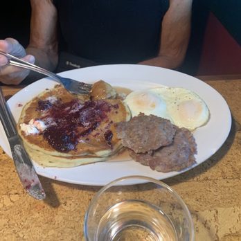 The Cafe - Pancakes with blueberry compote, sausage 2 eggs - Bakeries Near Me - Ames, Iowa The Cafe - Pancakes with blueberry compote, sausage 2 eggs - Bakeries Near Me - Ames, Iowa