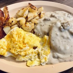 9 Mile Grill - Biscuits and gravy, bacon, scrambled eggs with cheese, and home fries
