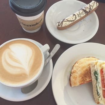 Bean Rush Cafe - Caramel latte, biscotti, spinach egg white tomato cheese on an English muffin - Coffee & Tea Near Me - Annapolis, Maryland