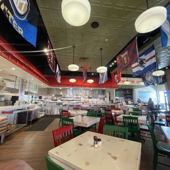 Mandola’s Italian Kitchen - Dining area with kitchen in back. - Italian Near Me - Odessa, Florida Mandola’s Italian Kitchen - Dining area with kitchen in back. - Italian Near Me - Odessa, Florida