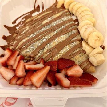 Lumi's Crepes - Nutella Crepe with strawberries and bananas added - Desserts Near Me - Georgetown, Texas Lumi's Crepes - Nutella Crepe with strawberries and bananas added - Desserts Near Me - Georgetown, Texas