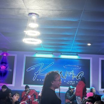 Karma Restaurant & Lounge - a group of people dancing - Lounges Near Me - Hampton, Virginia