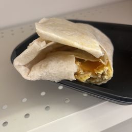The most pathetic excuse for a 13 dollar burrito I ever seen.