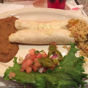 Chuy's - Chicka chicka boom boom (chicken enchilada with boom boom sauce on the side). - Tex-Mex Near Me - Orlando, Florida Chuy's - Chicka chicka boom boom (chicken enchilada with boom boom sauce on the side). - Tex-Mex Near Me - Orlando, Florida