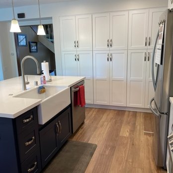 Signature Design Center - After - wall of pantry with wider shelves for more storage. - General Contractors Near Me - Anaheim, California Signature Design Center - After - wall of pantry with wider shelves for more storage. - General Contractors Near Me - Anaheim, California