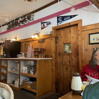 Lake Placid Inn - a woman sitting at a table - New American Near Me - Minocqua, Wisconsin