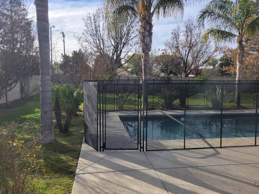 Pool Gates - Why Pool Gates are essential for pool safety & how pool gates work with pool fences?
For pool owners living in Bakersfield, California, pool gates are an essential part of pool safety, ensuring that unauthorized individuals cannot gain access to the pool area. Pool gates work in conjunction with a properly installed and maintained pool fence, keeping children and pets away from the water while providing easy access for adults.

Pool gates function by securing the entry point with a simple latch or lock mechanism, which can be easily opened when needed. To ensure reliable security, it is important to purchase quality pool gates from a reputable manufacturer like Life Saver Pool Fence.

These pool safety gates will be properly installed to ensure safe and secure operation year after year, without any issues with wear and tear.

In addition to providing additional layer of protection, well-designed pool gates also enhance the aesthetic appeal of your outdoor space by complementing the look of your pool fence.

Pool owners who invest in quality pool gates can rest assured that they are taking all necessary steps to keep their loved ones safe while enjoying their backyard oasis.
