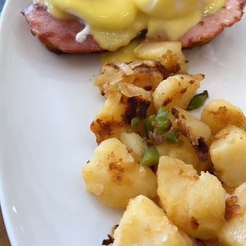 Spotted Cow Cafe & Grill - Eggs Benedict with potatoes. - Coffee & Tea Near Me - Roscoe, New York Spotted Cow Cafe & Grill - Eggs Benedict with potatoes. - Coffee & Tea Near Me - Roscoe, New York