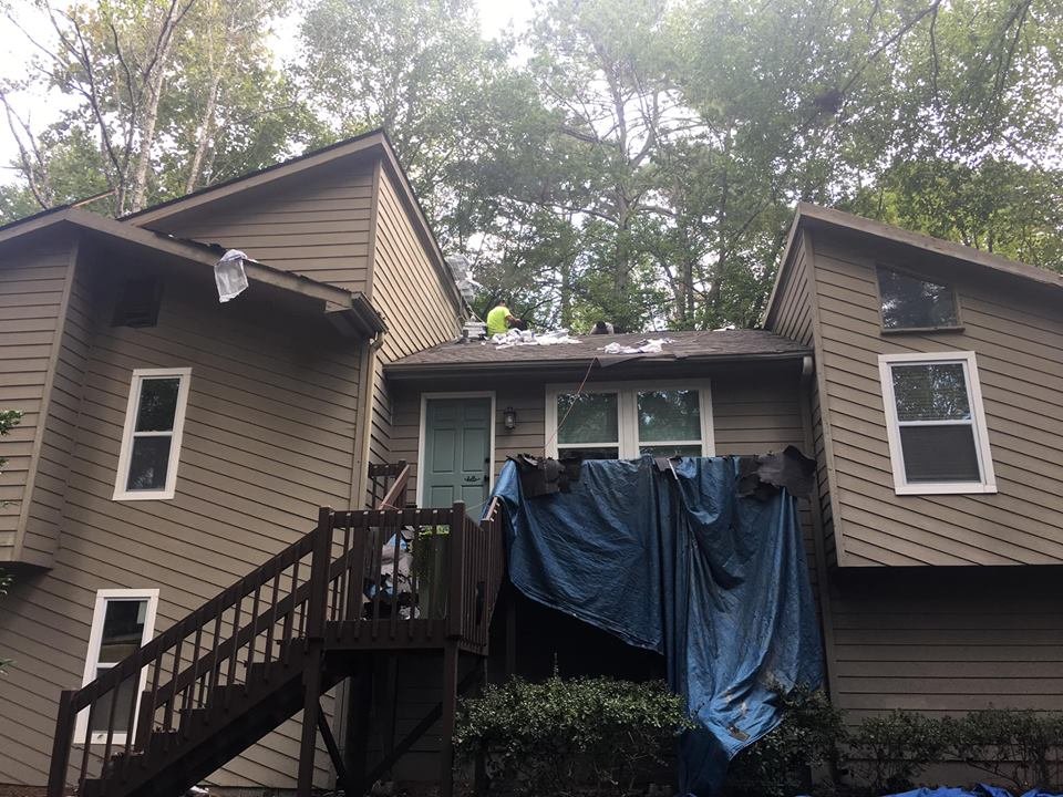 Slide of Exquisite Roofing and Restoration