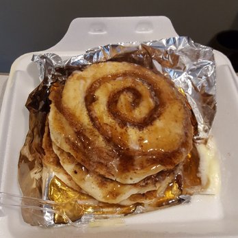 Nelsons Cafe - First timer here, cinnamon swirl pancakes with icing and syrup. The aroma hit my nose and made my stomach growl lol. These were a smash hit. - American Near Me - Niagara Falls, New York