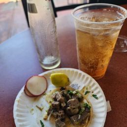 Tacos de Lengua (beef tongue) and a sidral Tacos de Lengua (beef tongue) and a sidral