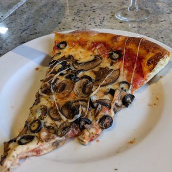 Crushed Pizzeria - Pizza in its natural state...a nice slice! - Pizza Near Me - Chicago, Illinois Crushed Pizzeria - Pizza in its natural state...a nice slice! - Pizza Near Me - Chicago, Illinois