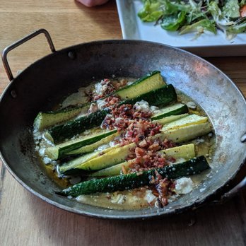Hal’s Cafe - McMenamins - Wood-fired zucchini with bleu cheese, bacon, and maple-stout vinaigrette - Bars Near Me - Portland, Oregon Hal’s Cafe - McMenamins - Wood-fired zucchini with bleu cheese, bacon, and maple-stout vinaigrette - Bars Near Me - Portland, Oregon