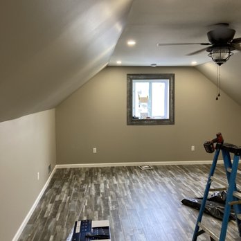Zonin Construction Group - a room with wood flooring - General Contractors Near Me