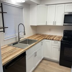 Roger's Repair - Designed and installed new kitchen cabinets and layout