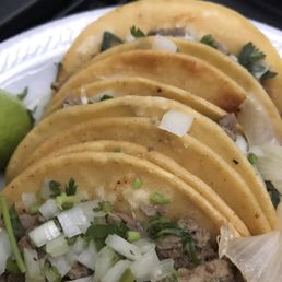 Asada tacos....after we ate two. They are soo good. Asada tacos....after we ate two. They are soo good.
