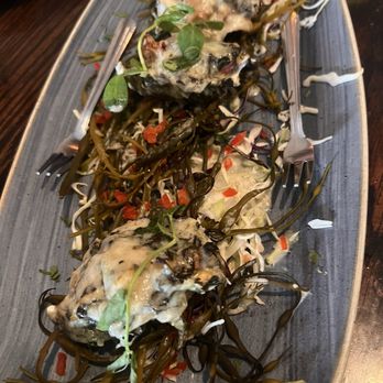Wence's - This is  4 Rockefeller oysters backed with bacon, spinach, asiago, and Garlic. - New American Near Me - Pleasant Hill, California