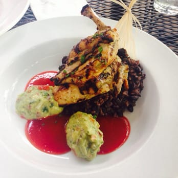 Zocalo - Chicken with black bean and rice with guacamole on the side. - New American Near Me - Charlottesville, Virginia Zocalo - Chicken with black bean and rice with guacamole on the side. - New American Near Me - Charlottesville, Virginia