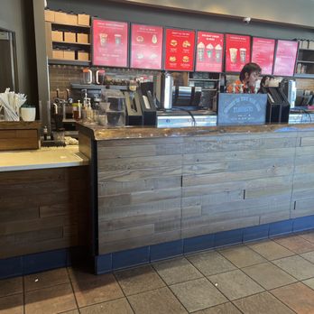 Starbucks - a coffee shop counter with a customer - Coffee & Tea Near Me - Blue Ash, Ohio Starbucks - a coffee shop counter with a customer - Coffee & Tea Near Me - Blue Ash, Ohio