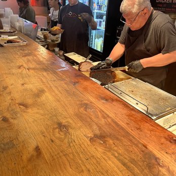 Stiles Switch BBQ & Brew - Cutting Brisket - Barbeque Near Me - Austin, Texas Stiles Switch BBQ & Brew - Cutting Brisket - Barbeque Near Me - Austin, Texas