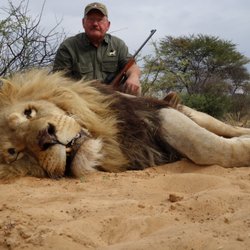 Coastal Professional Services - Owner with gorgeous lion 2014