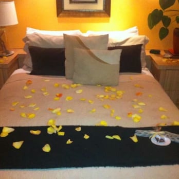Casa Tropicana - Rose pedals on the bed for our Valentine's Day. - Hotels Near Me - San Clemente, California