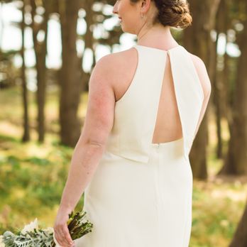 Pins & Curls - back view photo by: photography by vee - Hair Stylists Near Me Pins & Curls - back view photo by: photography by vee - Hair Stylists Near Me
