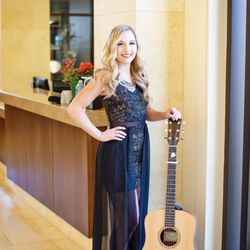 Temple Beth El - Jessie Chris. Donating her guitar for charity.