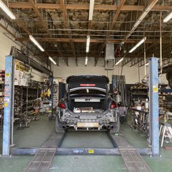 Scottsdale Muffler & Automotive - Removing my exhaust tips as well as my midpipe. Replacing with custom black tip made by the crew at Scottsdale muffler.
