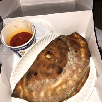 Home Slice Pizza - Meat calzone with a well done request. It's a big one. - Pizza Near Me - Austin, Texas