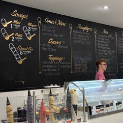 View when you walk in with a menu board behind the counter
