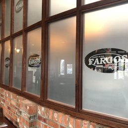 a restaurant window with frosted glass