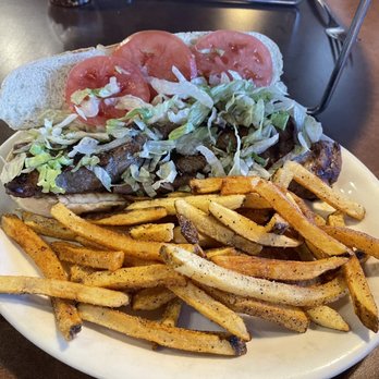 Wall Street Grill - Ribeye sandwich with fries - New American Near Me - Humboldt, Tennessee Wall Street Grill - Ribeye sandwich with fries - New American Near Me - Humboldt, Tennessee