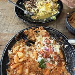 2. Chilaquiles & Protein Green salsa with asada and eggs. Red salsa with chorizo and papas.