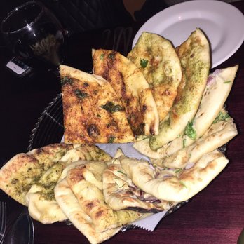 India Restaurant - Naan half sampler, can't imagine the size of the full sampler! So good and good portion. Shared by 3 people. - Indian Near Me - Providence, Rhode Island