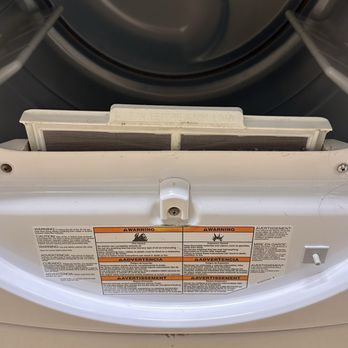 Fairfield by Marriott Inn & Suites Huntington - Dryer lint trap was stuck in this position and it caused the dryer to not dry properly. - Hotels Near Me - Huntington, West Virginia