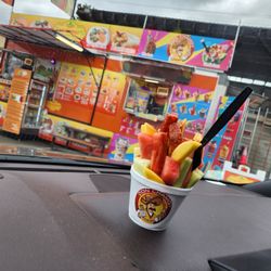 Las Palmas Taco Factory - My dessert. Fruit and valentina with tajin.