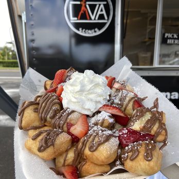 Hawaii Lava Scones - a person holding a plate of food - Food Trucks Near Me - Kamuela, Hawaii
