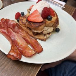 Amazing French Toast and berries. Streaky bacon was great Amazing French Toast and berries. Streaky bacon was great