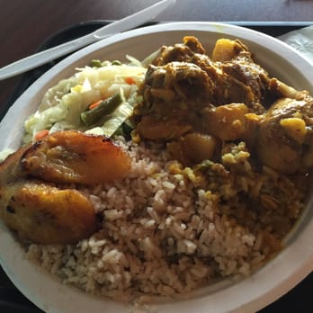 Norah's Irie - Jamaican Curry Chicken, fall off the bone good, Plantains, rice and Cabbage. You can feel the home cooked love with every bite - Caribbean Near Me - Long Branch, New Jersey
