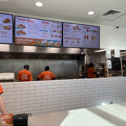 Popeyes Louisiana Kitchen - Front counter/menu board