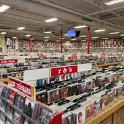 Photo of Cheapo Records - Minneapolis, MN, United States. View as you enter. The colored vinyl covering the walls a sight to see.