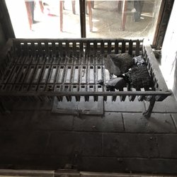 High Hat Chimney Sweep Co - The inside of the fireplace still had ashes and stuff that had fallen from the cleaning even the webs in the corner had not been sucked up
