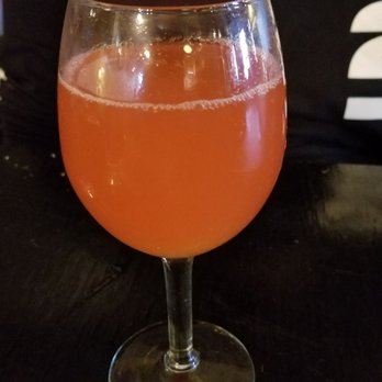 Charlies Bar & Kitchen - The Bellini (vodka with cranberry, pineapple juice, and some other flavors) - Cocktail Bars Near Me - Bronx, New York Charlies Bar & Kitchen - The Bellini (vodka with cranberry, pineapple juice, and some other flavors) - Cocktail Bars Near Me - Bronx, New York