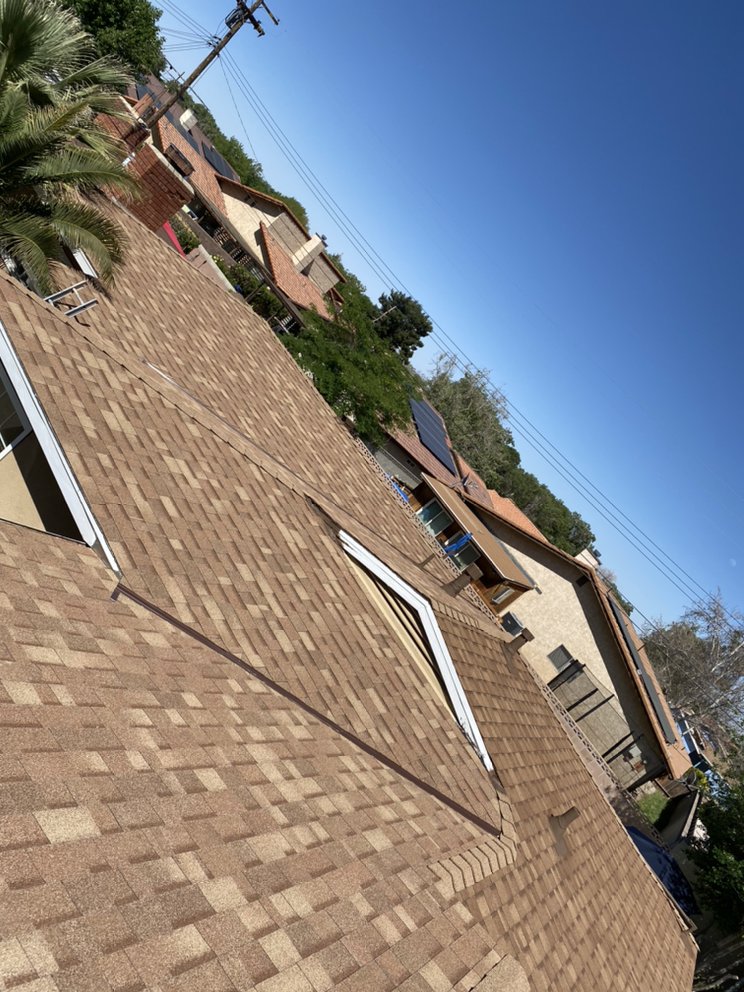 Slide of Benny’s Roofing Services