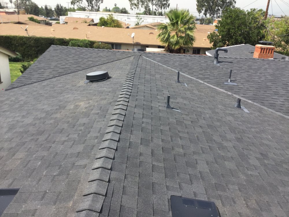 Slide of MA Roofing and Gutters