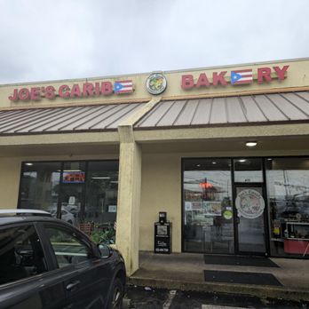 Joe's Caribe - Sign - Food Trucks Near Me - Pensacola, Florida Joe's Caribe - Sign - Food Trucks Near Me - Pensacola, Florida